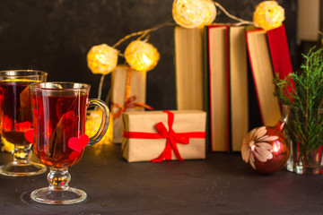Tea and festive atmosphere (heart and love) Hot Beverages on the table. Copy space.