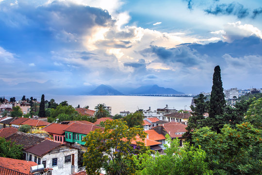 Landscape from the window to the roofs and the sea in the area of Kaleici, Antalya, Turkey