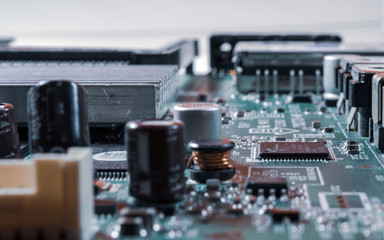 Fototapeta na wymiar electronics components on circuit board cold light