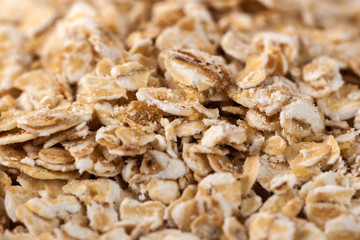 Rolled oats background. Organic oatmeal background texture