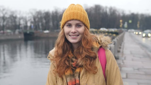 Young Red Hair Caucasian Woman Face Portrait In City