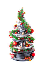 Abstract christmas tree of car parts on a white background. Decorated with Christmas toys, garland