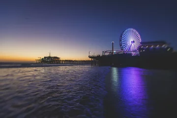 View of historic Santa Monica pier, with beach, amusement park, shops and restaurants, Los-Angeles, California, United States of America © tsuguliev