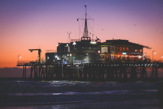 View of historic Santa Monica pier, with beach, amusement park, shops and restaurants, Los-Angeles, California, United States of America
