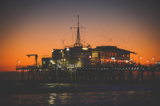 View of historic Santa Monica pier, with beach, amusement park, shops and restaurants, Los-Angeles, California, United States of America