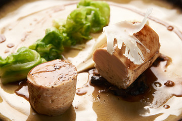 Homemade chicken sausage meat with baked green cabbage.