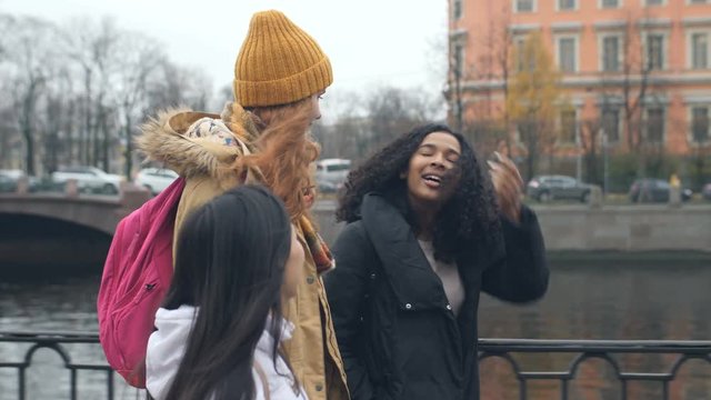 Multi Ethnic Girls Walking Talking Having Fun In City