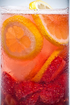 Drink with lemon and strawberries