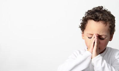 little boy praying