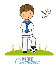 my first communion boy. Boy in communion costume and soccer ball