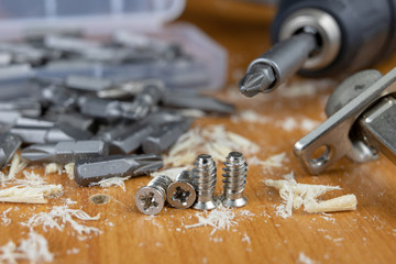 Installation of chipboard furniture in a carpentry workshop. Accessories and tools for carpenters.