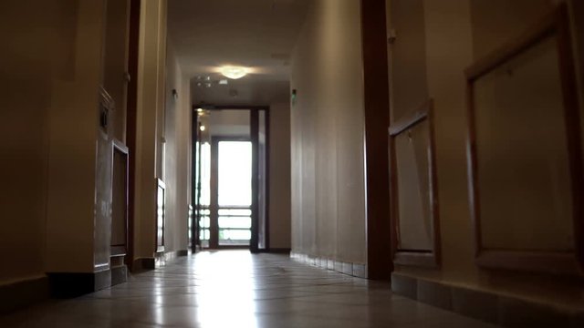 POV Smooth Wide Angle Shot Through Residential Hallway Corridor
