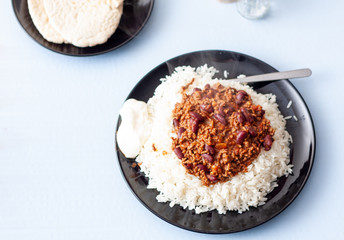 A plate of home-made chilli con carne with white long grain rice