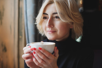 Beautiful Woman Drinking Coffee