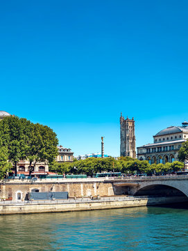Saint-Jacques Tower and Fontaine du Ch&Atilde;&cent;telet in Paris, France, vertical