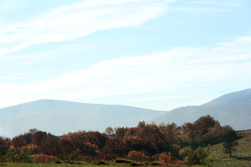 Fototapeta premium Beautiful landscape with blue sky over mountain slopes