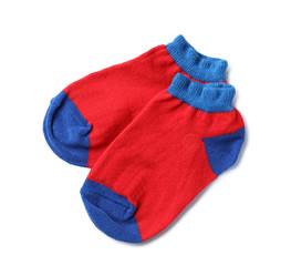 Cute child socks on white background, top view