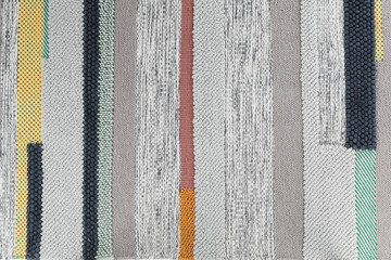 Striped carpet as background, top view. Interior element