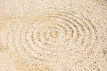 Fototapeta na wymiar Pattern on the yellow sand.