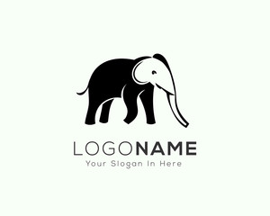 elephant head with negative head logo design inspiration