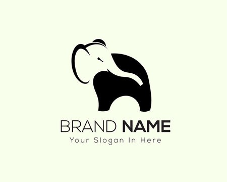 stand elephant with head in negative space logo design inspiration