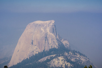 View towards Half Dome on a day with low visibility due to the smoke coming from the Ferguson Fire, Yosemite National Park, California
