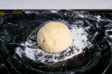 Dough on a black surface