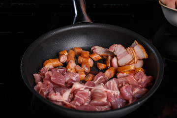 Frying pan with different kinds of meat