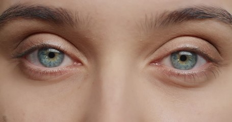 close up beautiful eyes blinking natural female beauty healthy eyesight macro