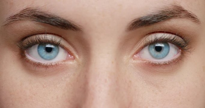 close up macro blue eyes opening natural human beauty