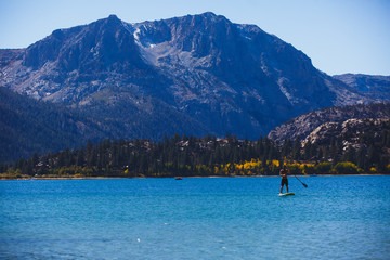 Beautiful vibrant panoramic view of June Lake, Mono County, California, with Mountains of Sierra Nevada and Carson Peak in the background, United States