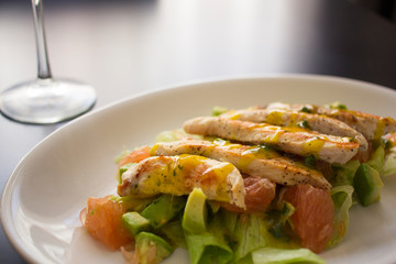 healthy Chicken salad served on a white plate