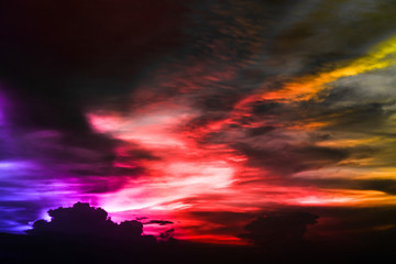 Fototapeta na wymiar Eternal flame rainbow cloud and evening sky and ray light of sunset
