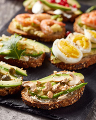 Close-up view of avocado toasts. Plant-based food