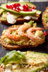 Close-up view of avocado toasts. Plant-based food
