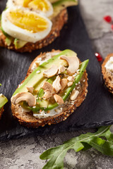 Close-up view of avocado toasts. Plant-based food