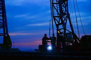 The oil workers in the job