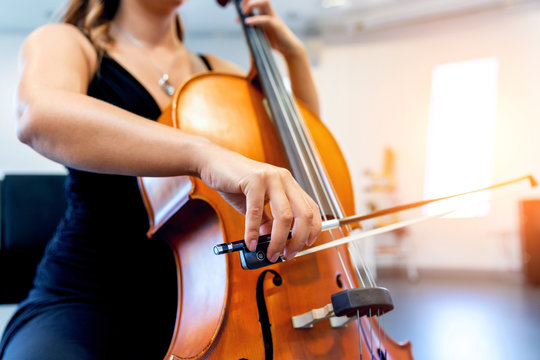 Close Up Of Cello With Bow In Hands