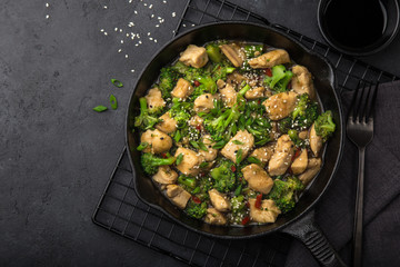 teriyaki chicken and broccoli in cast iron pan