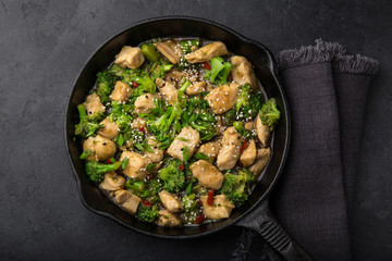 teriyaki chicken and broccoli in cast iron pan