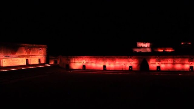 Illuminated Nun's Quadrangle (Cuadrangulo de las Monjas) building complex at the ruins of the ancient Mayan city Uxmal, Mexico