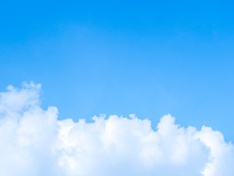 Blue sky and Beautiful white clouds, Cloudscape with Color fade gradient blue to white for background © bwittaya