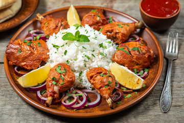 Chicken cooked in a Tandoori oven with basmati rice.