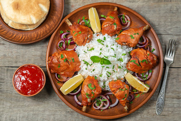 Chicken cooked in a Tandoori oven with basmati rice. The view from the top. Copy-space.