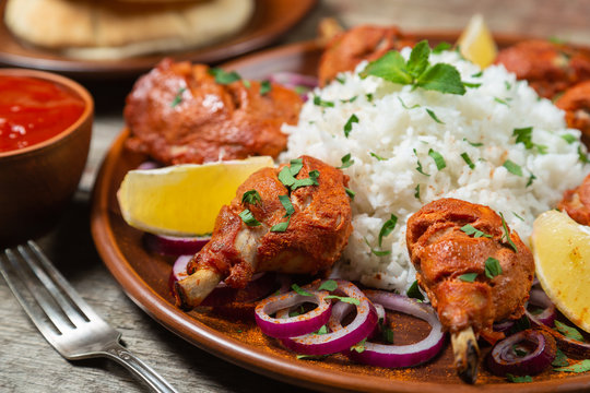 Chicken cooked in a Tandoori oven with basmati rice. 