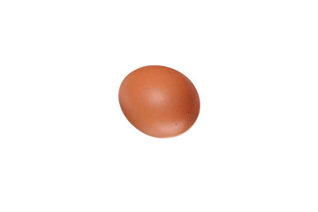 Brown chicken egg on a white background. Isolated photo.