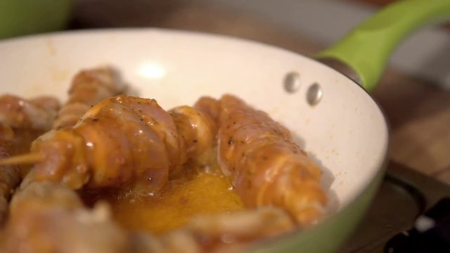 Barbecue skewers of meat frying, shish kebab