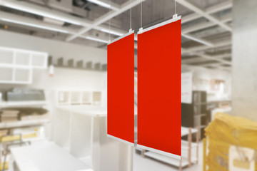 Mock-up blank red banner for advertising design promotion at showroom.