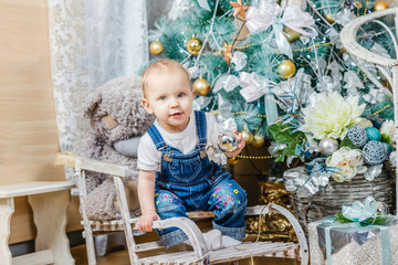 little girl near the Christmas tree