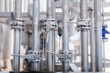 Production of milk and yogurt at the plant. Metal units and tanks for storage and transportation.